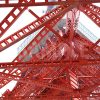 鉄骨越しに見上げる東京タワーの写真・フォト