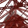 鉄骨越しに見上げる東京タワーの写真・フォト