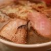 ラーメンに浮かぶチャーシューの写真・フォト素材