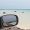沖縄の海と車のサイドミラー